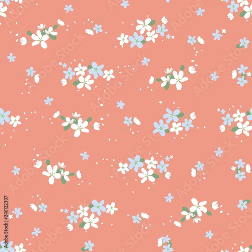 Seamless floral pattern with small cute flowers on a pink background. Spring light airy texture for Wallpaper, interior, tiles, textiles, scrapbooking, packaging and various types of design. vector.