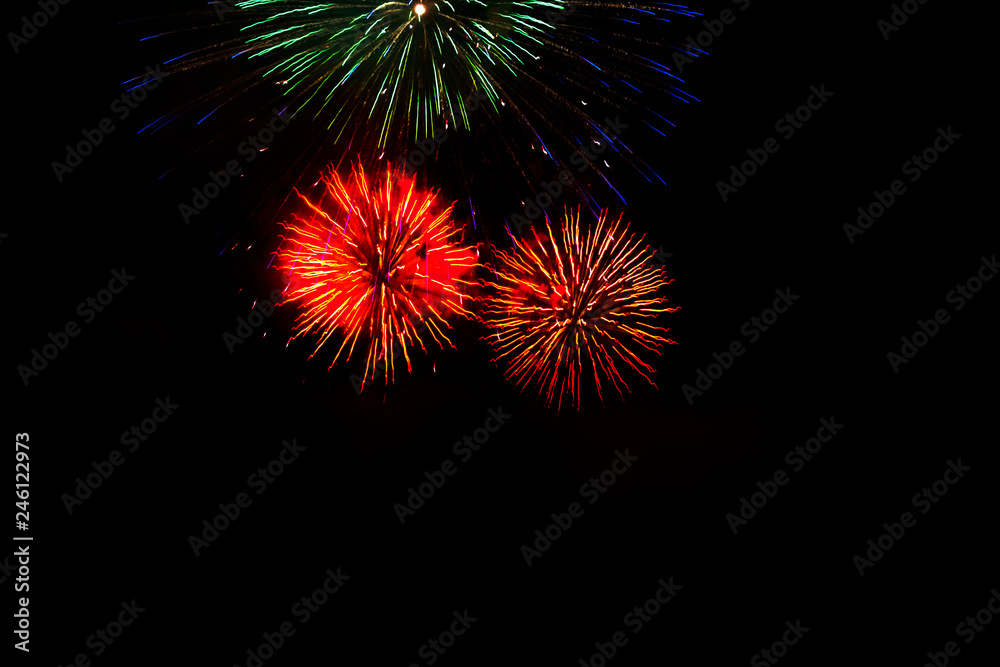 Awesome isolated Festive fireworks on a dark background. Can be used as wallpaper or background Awesome isolated Festive fireworks on a dark background. Can be used as wallpaper or background