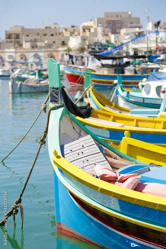 Typical maltese fishing boats, called luzzu with the eye of Osiris, in Marsaxlokk, Malta