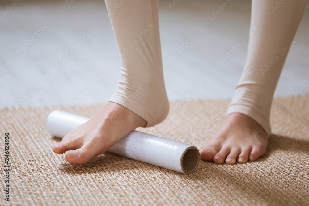 Exercises from edema during pregnancy. Young Pregnant woman removes leg