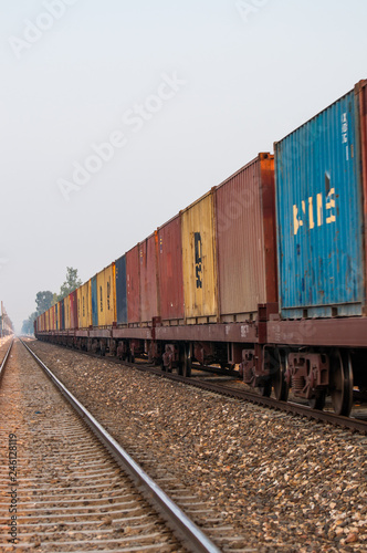 Cargo freight train passing through the countryside 