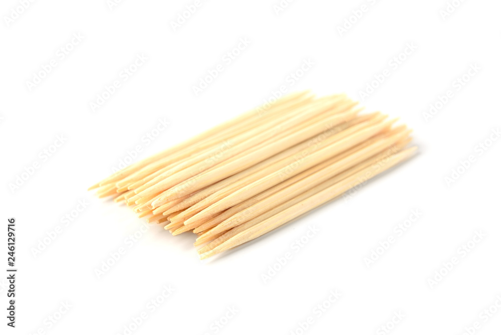 Wooden toothpicks isolated on white background. Wooden toothpicks isolated on white background.