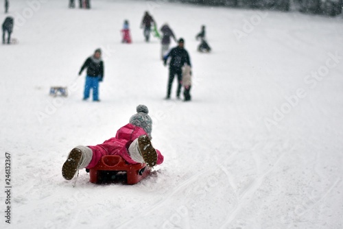 Courageous child sledding