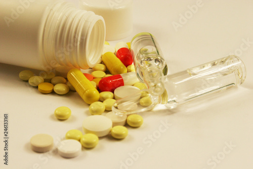 Pharmaceutical medicament, cure in container for health on white background.