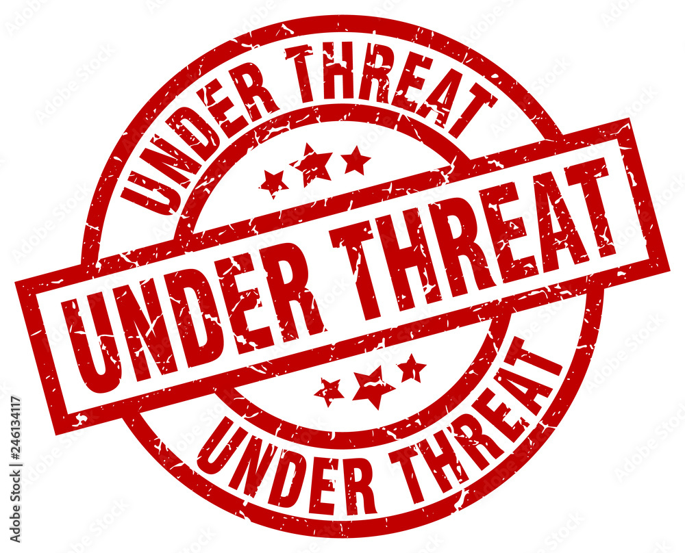 under threat round red grunge stamp