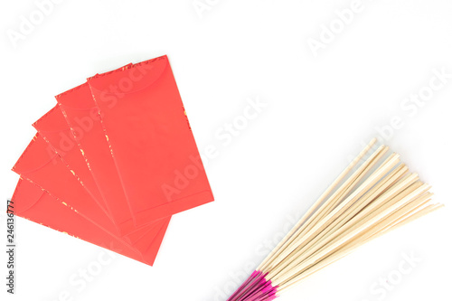 Happy Chinese new year, Hand holding red envelope or called Angpao isolated on white background