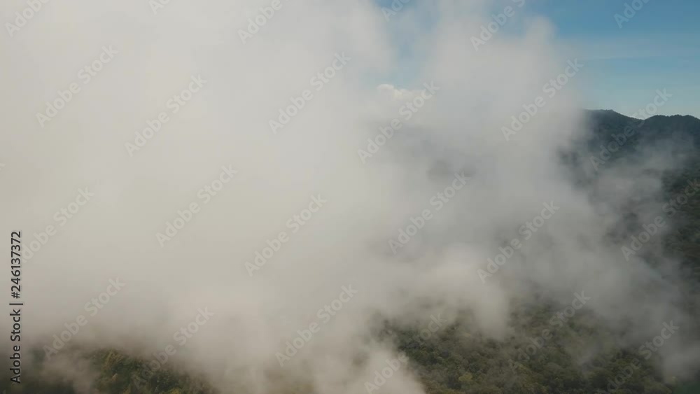 Aerial view of under the clouds, to the mountains and the lake. Lake Buyan,caldera lake at Bali. Landscape, lake among mountains, sky, clouds. 4K video. Aerial footage. Aerial view of under the clouds, to the mountains and the lake. Lake Buyan,caldera lake at Bali. Landscape, lake among mountains, sky, clouds. 4K video. Aerial footage.