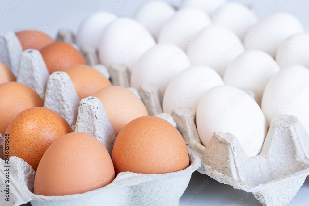 chicken eggs in a cardboard tray on background chicken eggs in a cardboard tray on background