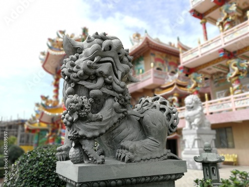 Chinese lion statue at the front of Chinese temple