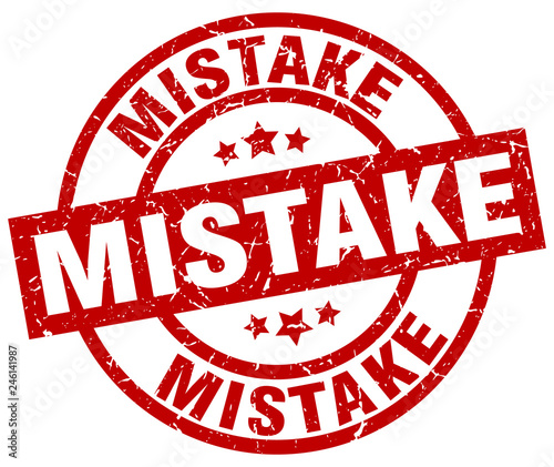 mistake round red grunge stamp