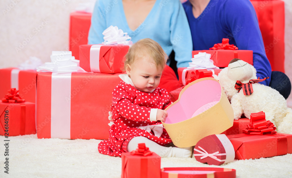father, mother and doughter child. Love and trust in family. Bearded man and woman with little girl. Happy family with present box. Shopping. Boxing day. Valentines day. Red boxes. You should try it father, mother and doughter child. Love and trust in family. Bearded man and woman with little girl. Happy family with present box. Shopping. Boxing day. Valentines day. Red boxes. You should try it
