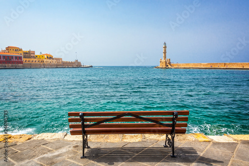 Empty bench with view on the venitian habor of Chania in Crete, Grece