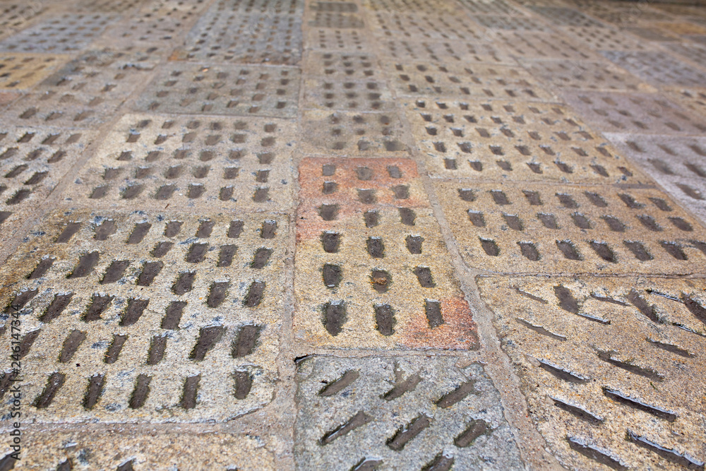 Fototapeta premium Old wet paving slabs after the rain