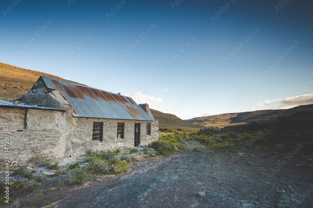 Wide angle view of an old abandoned building in the karoo region of south africa Wide angle view of an old abandoned building in the karoo region of south africa