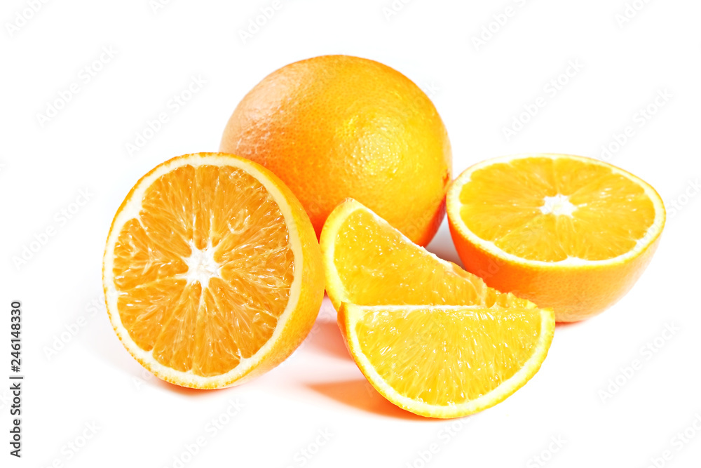 Close up image of juicy organic whole and halved oranges with visible core texture on isolated white background with a lot of copy space for text. Macro shot of bright citrus fruit slices. Top view. Close up image of juicy organic whole and halved oranges with visible core texture on isolated white background with a lot of copy space for text. Macro shot of bright citrus fruit slices. Top view.