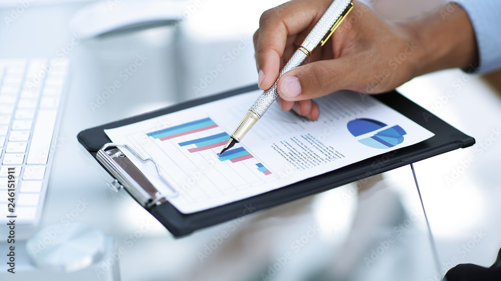 Fototapeta premium closeup.businessman working with a financial schedule. business concept