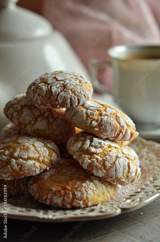 Crinkles cookies on a rustic saucer on a wooden background