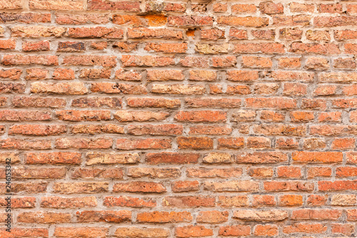 Od red brick wall texture background. bricked wall of orange color, wide vintage style.