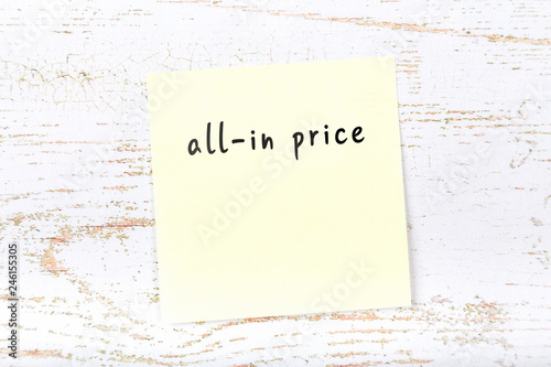 Yellow sticky note with handwritten text allin price photo
