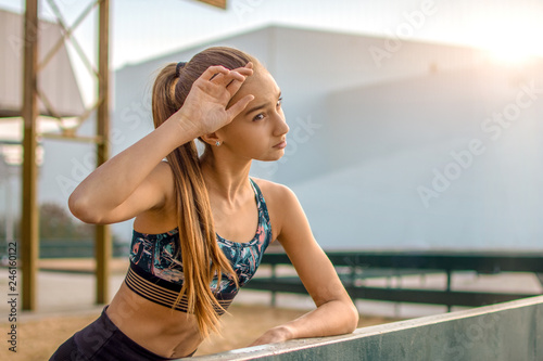 Sporty woman in sportswear doing fitness exercise plank