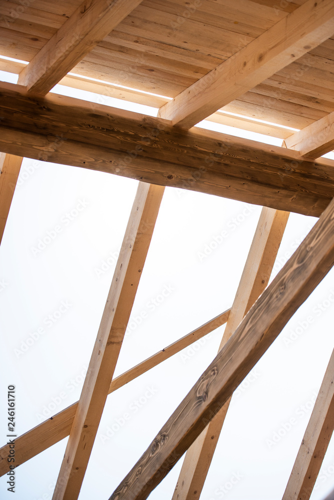 Obraz premium home currently under construction against blue sky