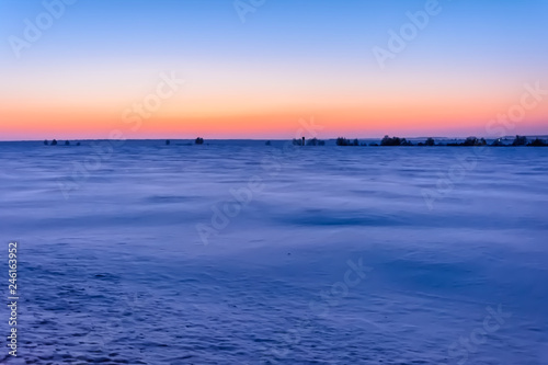 Fototapeta Naklejka Na Ścianę i Meble -  Sunrise in winter in the field