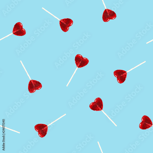 Candy sweet hearts pattern vector. Seamless vector pattern with hand drawn sketch lollipops. Wrapping textile fabric wallpaper valentines love design.