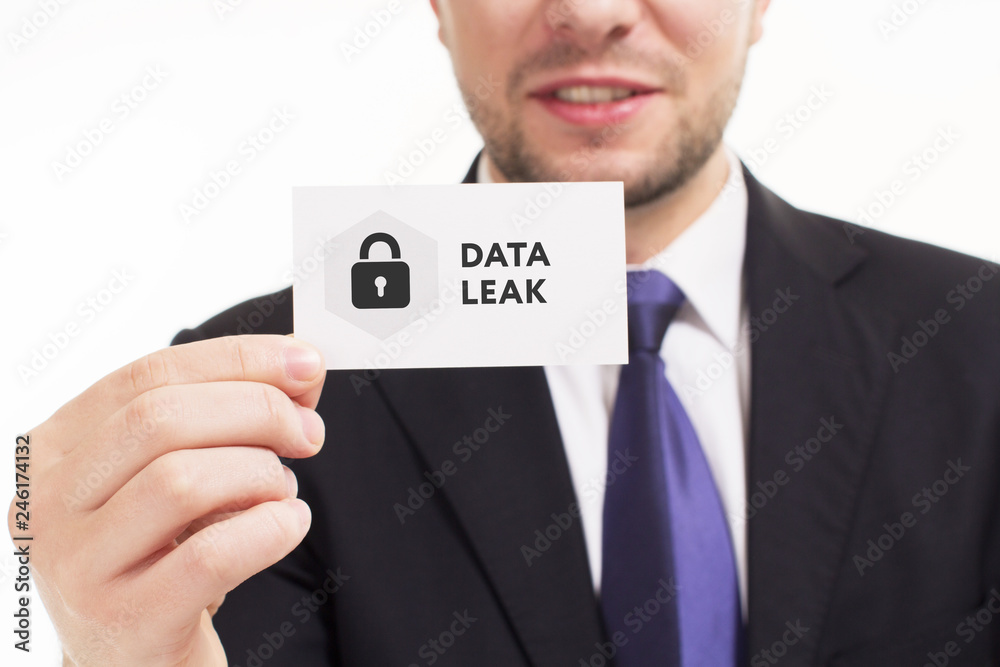 Business, technology, internet and networking concept. Young entrepreneur showing keyword: Data leak Business, technology, internet and networking concept. Young entrepreneur showing keyword: Data leak