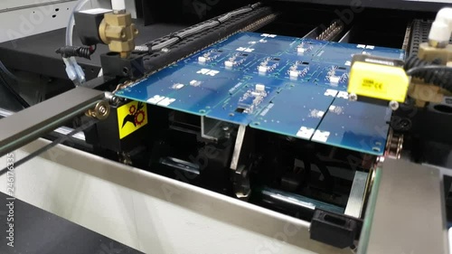 printed circuit board enters the reflow oven and is ready to be cooked photo