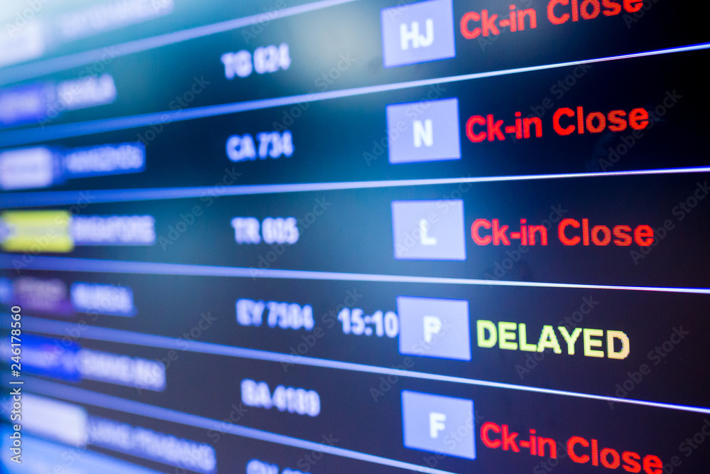 Selective focus to display flight information board in international airport Selective focus to display flight information board in international airport