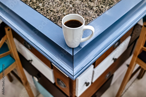 A cup of coffee on the bar photo