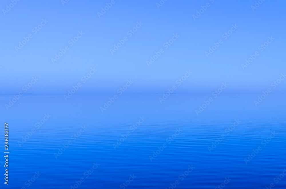 Blue Misty sunset over the River with horizon. Ukraine Blue Misty sunset over the River with horizon. Ukraine