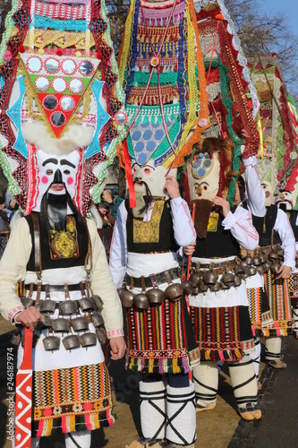 Pernik, Bulgaria - January 27, 2019 - Masquerade festival Surva in Pernik, Bulgaria. People with mask called Kukeri dance and perform to scare the evil spirits.