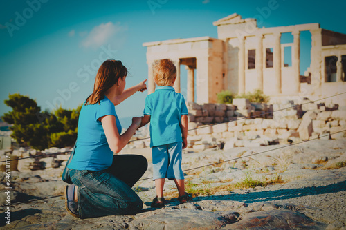 mother and son travel in Greece, looking at ancient buildings