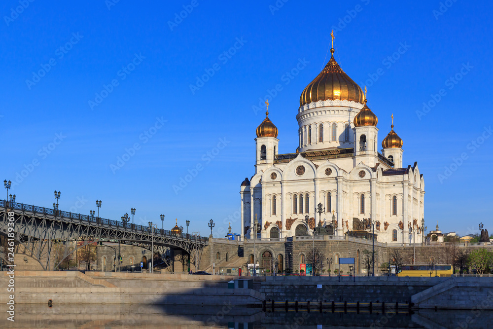 Cathedral of Christ the Saviour on Prechistenskaya Embankment of Moskva river in Moscow at sunny spring morning