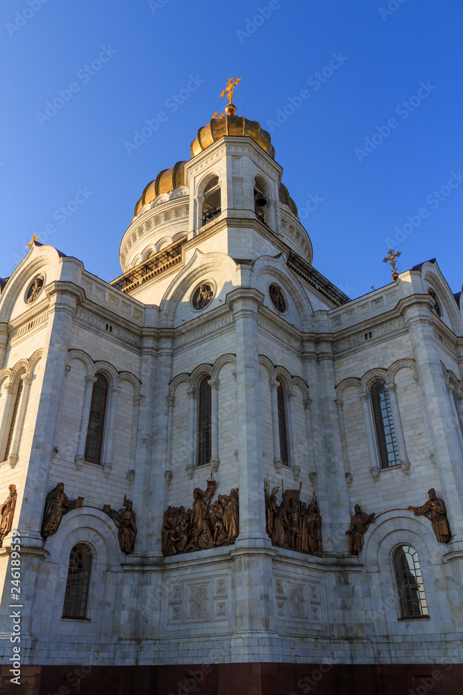 Bell tower of Cathedral of Christ the Saviour in Moscow against blue sky
