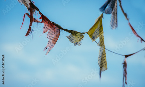 Tibetan prayer flag, blue sky photo