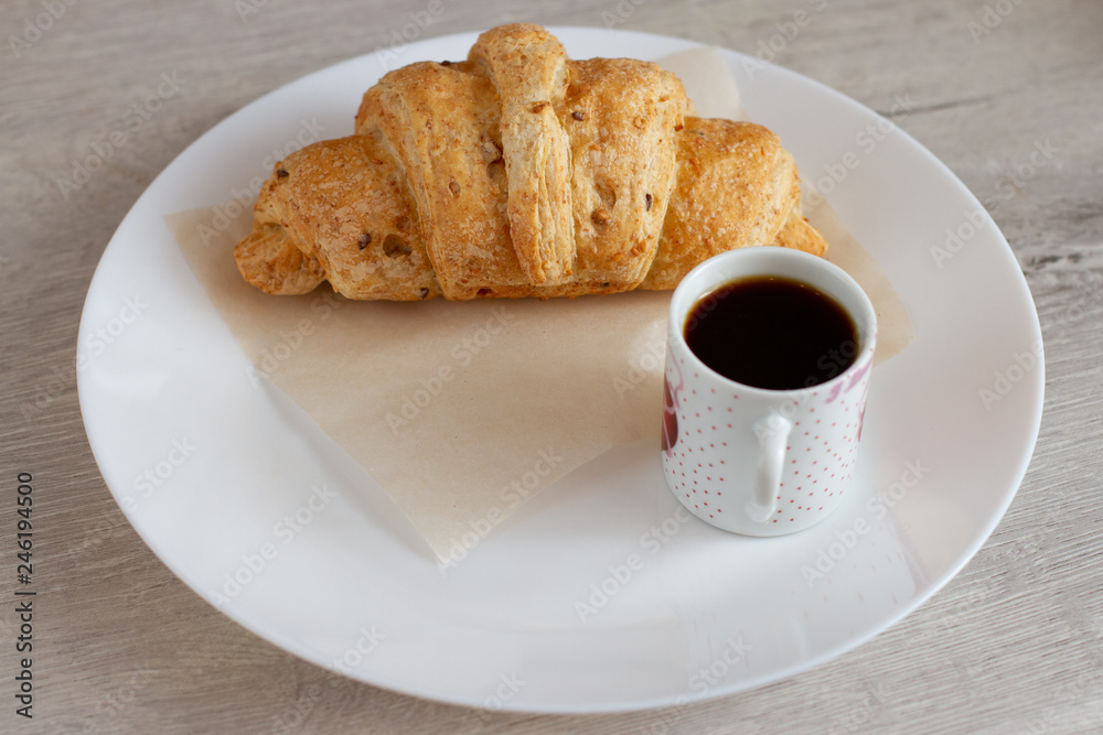 cup of coffee and cake on wooden table cup of coffee and cake on wooden table