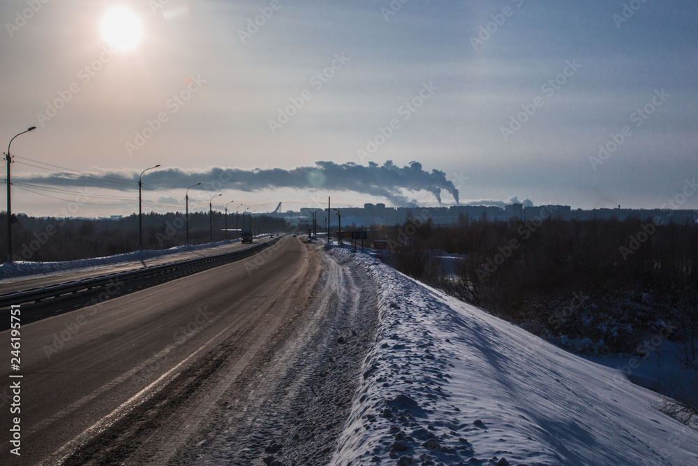 thick smoke from pipes low over the city