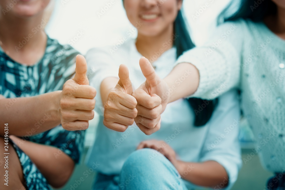 Three hands of businesswomen close hands, Demonstrates effective integration and success in business. Teamwork Ideas to streamline and succeed, The power of coordination will achieve the goal.