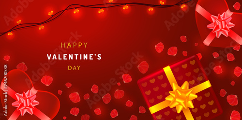 Beautiful valentines day background with heart-shaped gift boxes, garlands and rose petals. Greeting card template