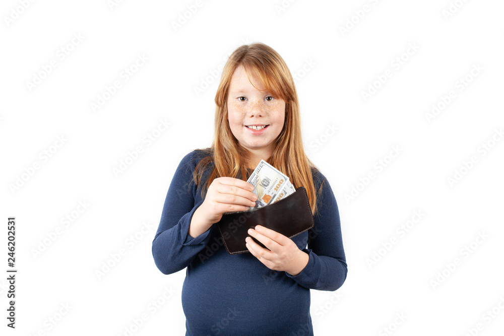 Rich fat girl holding in her hands pocket money. Child spending. Rich fat girl holding in her hands pocket money. Child spending.