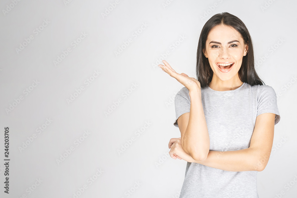 Portrait of a smiling pretty woman looking at camera isolated on a white background Portrait of a smiling pretty woman looking at camera isolated on a white background