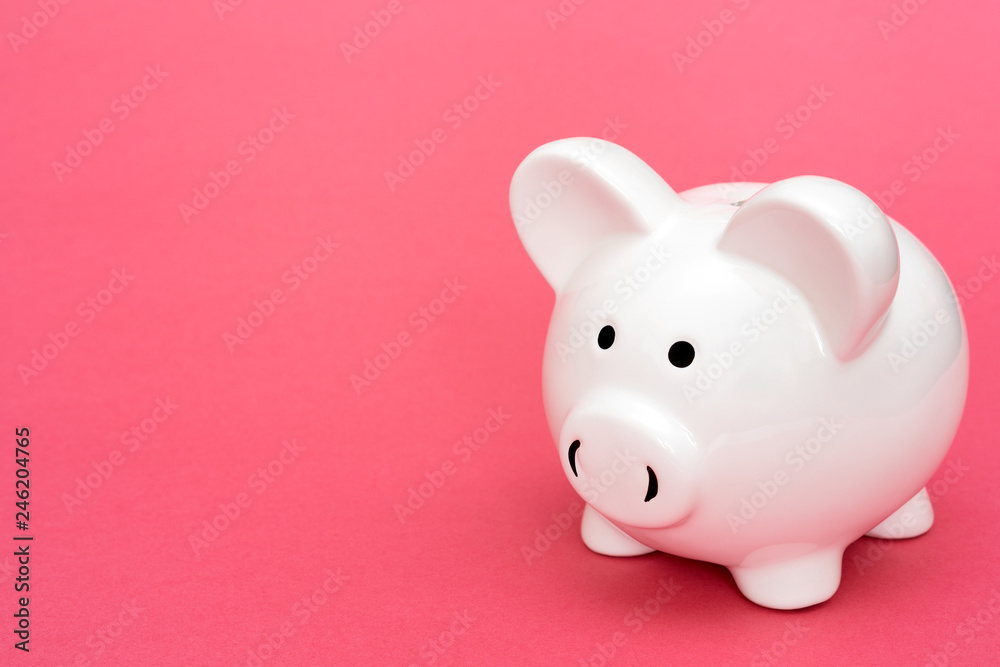 Piggy-bank on pink background