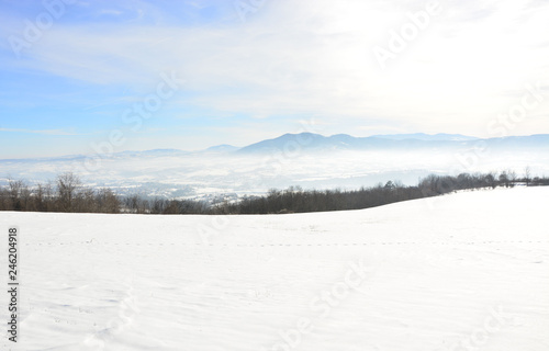 winter landscape with lake and sky