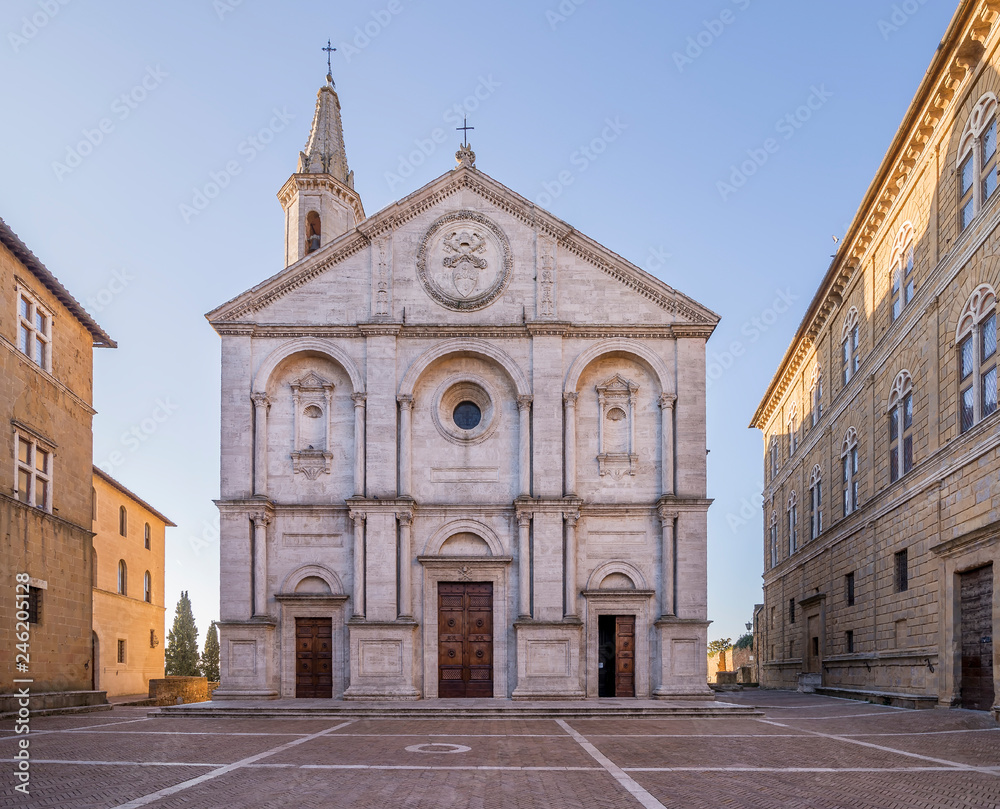 The beautiful facade of the Cathedral of the Assumption, the Duomo of Pienza, without people, Siena, Tuscany, Italy