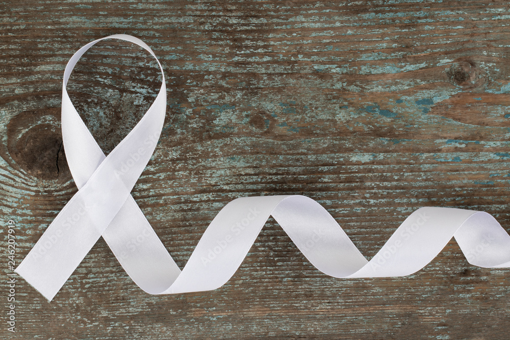 white ribbon. White or light pearl color ribbon for raising awareness on  Lung cancer, Bone cancer, Multiple Sclerosis, Severe Combined Immune  Deficiency Disease (SCID) and Newborn Screening symbol Stock-Foto | Adobe  Stock