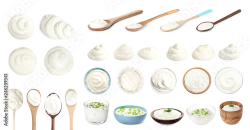 Murais de parede Set of delicious sour cream in dishware on white background