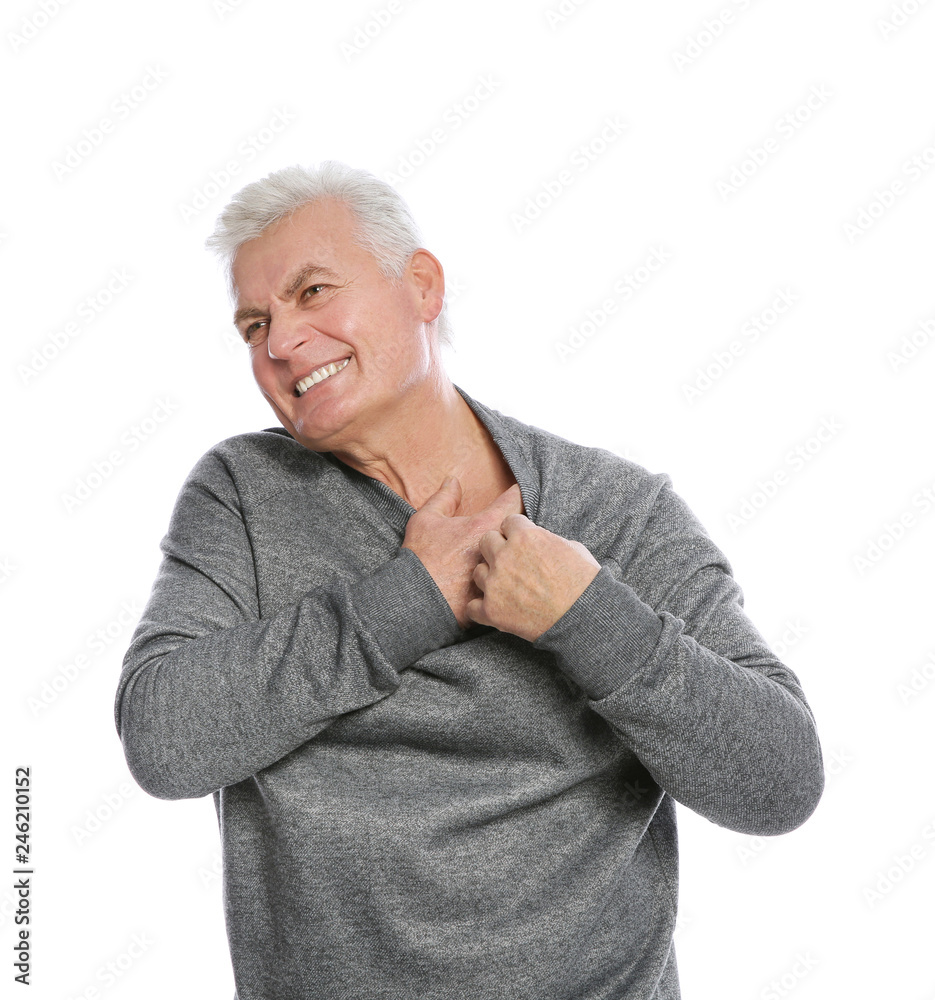 Mature man scratching chest on white background. Annoying itch Mature man scratching chest on white background. Annoying itch
