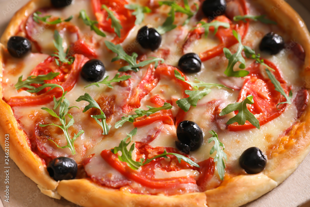 Tasty fresh pizza with olives in cardboard box, closeup Tasty fresh pizza with olives in cardboard box, closeup